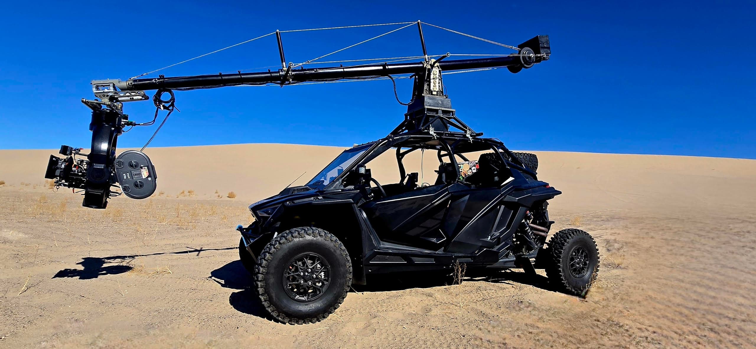 Polaris RZR side view on sand
