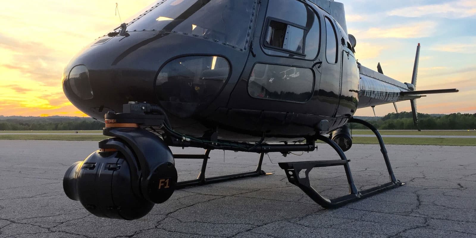 Shotover F1 gimbal on helicopter over waterfall