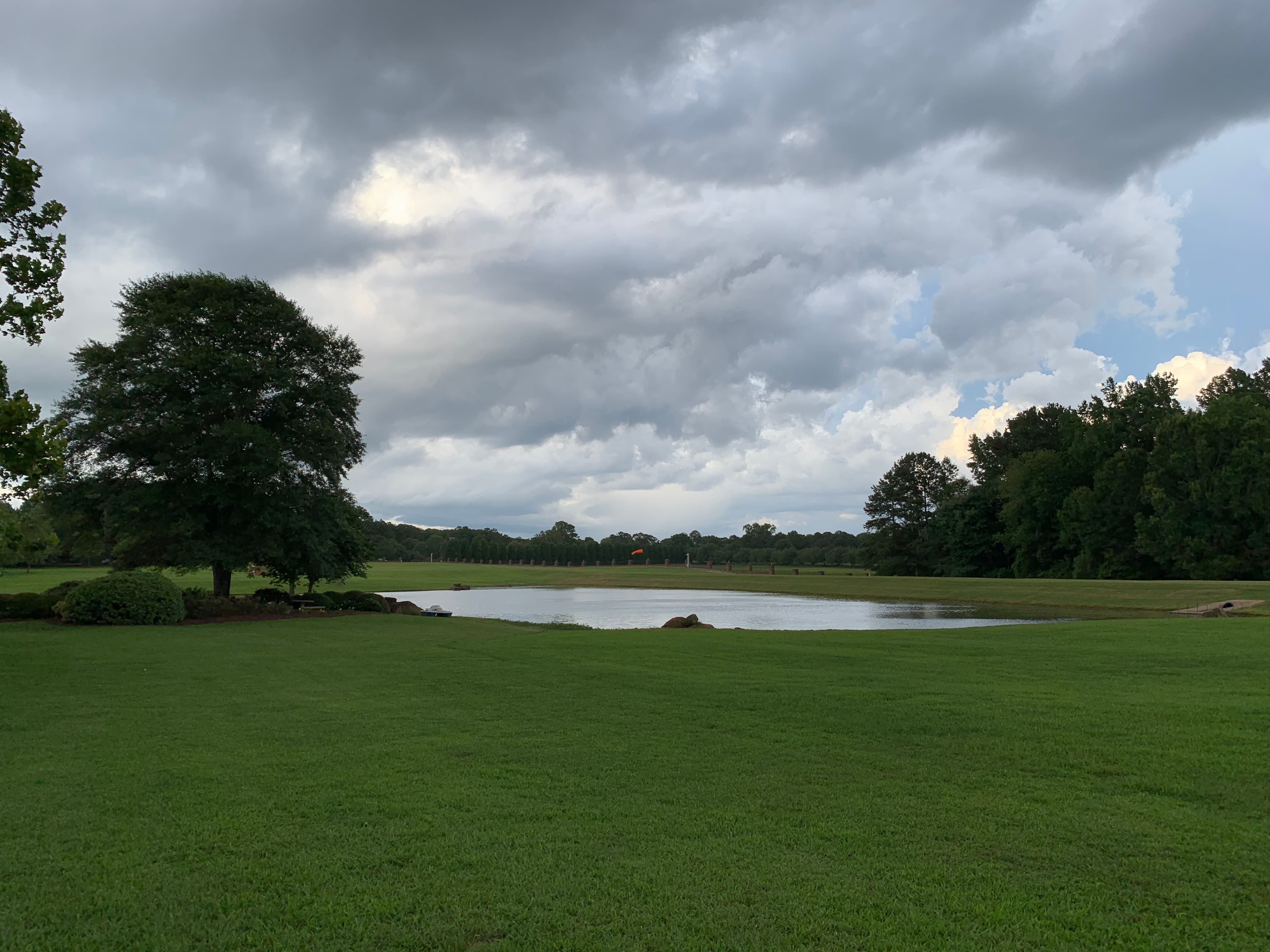 Pond with dramatic sky