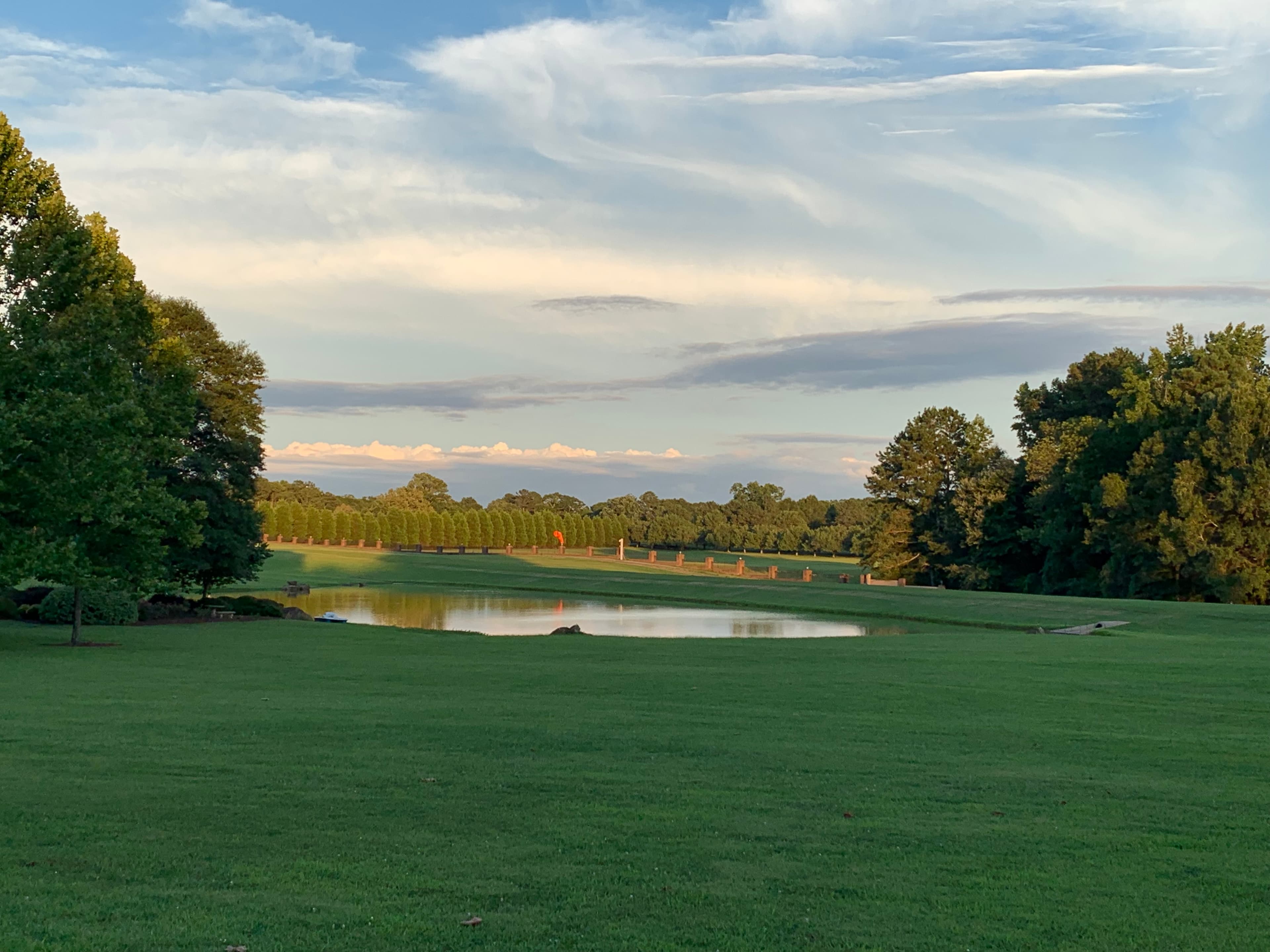 Pond and grounds at dusk